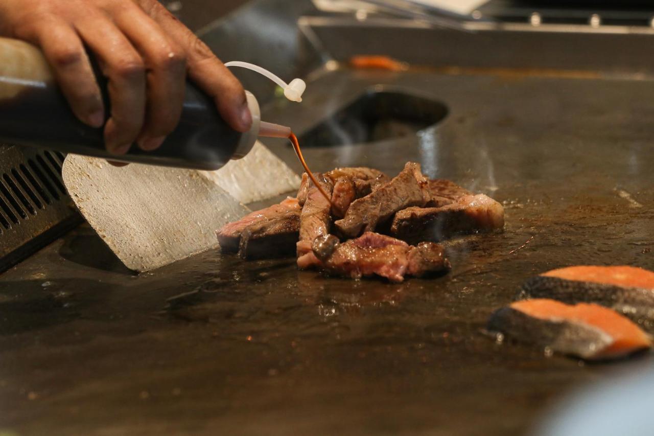 Chatrium Grand Бангкок Екстер'єр фото Soy sauce being used in cooking
