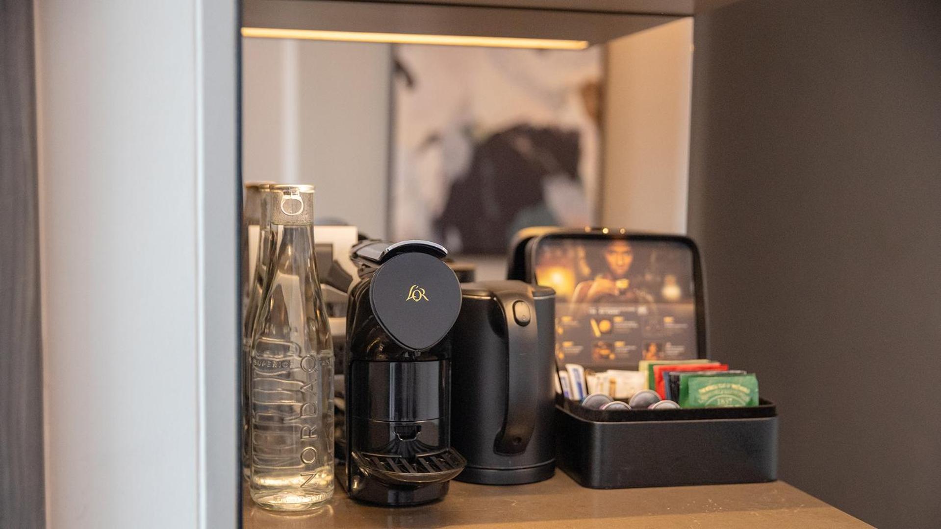 Chatrium Grand Бангкок Екстер'єр фото A Nespresso coffee machine in a hotel room